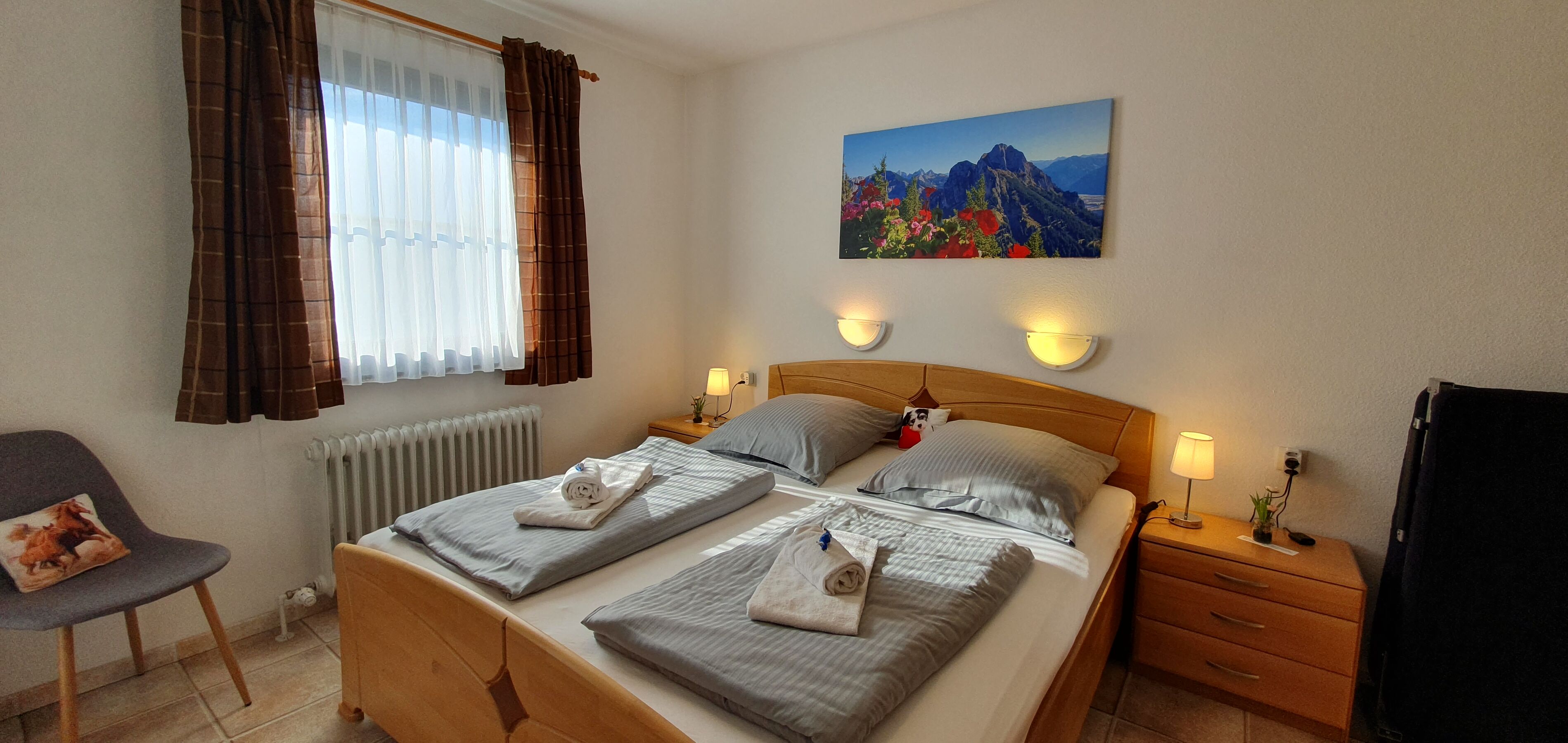 Schlafzimmer 1 mit Zugang zur Terrasse