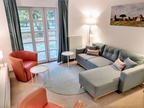 Der helle Wohnbereich in der unteren Wohnung)