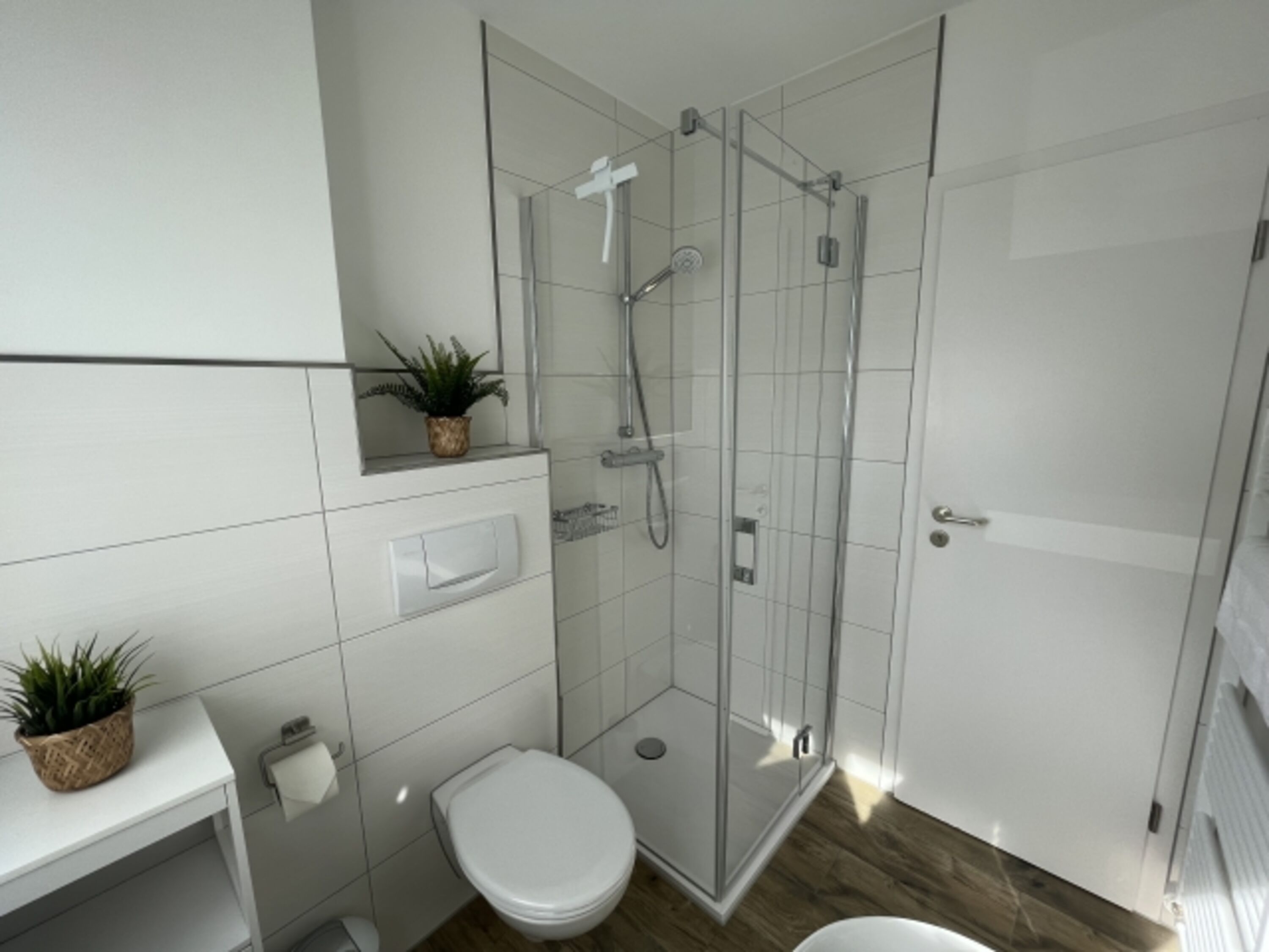 Bad mit bodentiefer Dusche