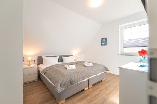 Schlafzimmer 1 mit Doppelbett im Obergeschoss