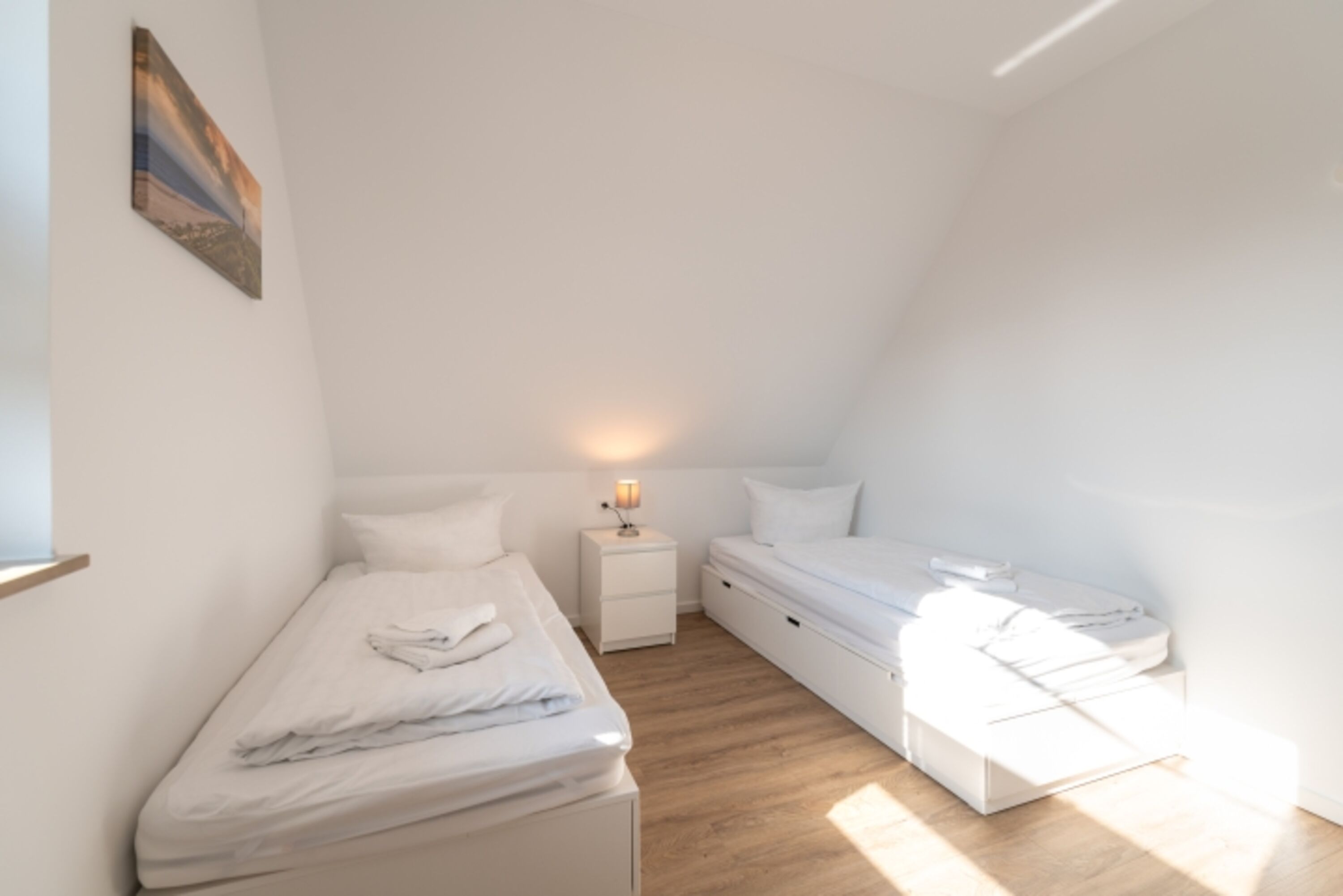 Schlafzimmer 2 mit zwei Einzelbetten im Obergeschoss