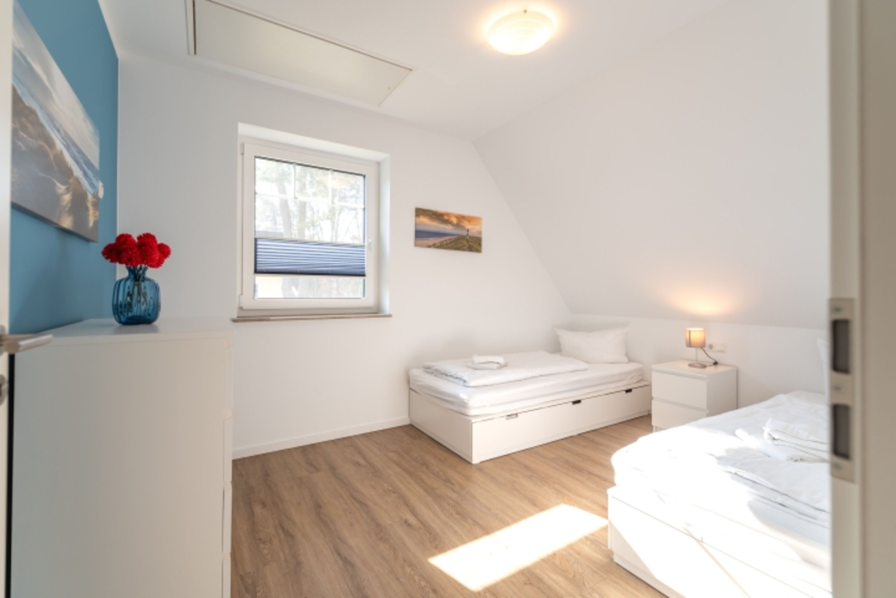 Schlafzimmer 2 mit zwei Einzelbetten im Obergeschoss