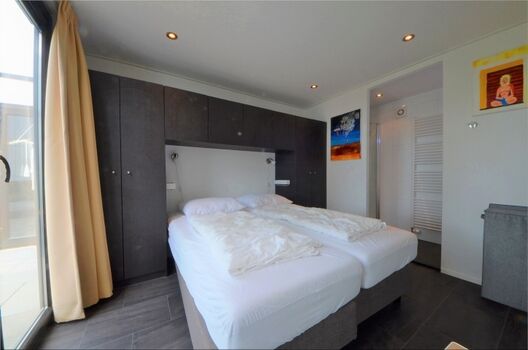 Schlafzimmer 1 mit Bad en Suite