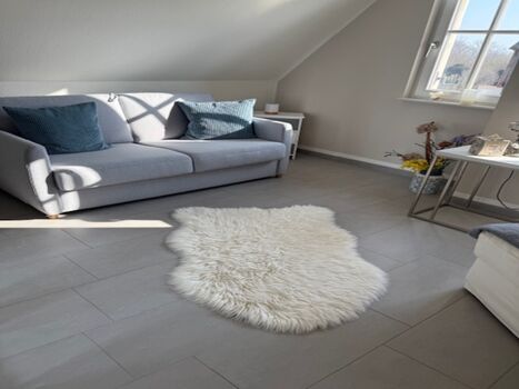 Schlafzimmer 2 im OG mit Schlafcouch und Ottomane