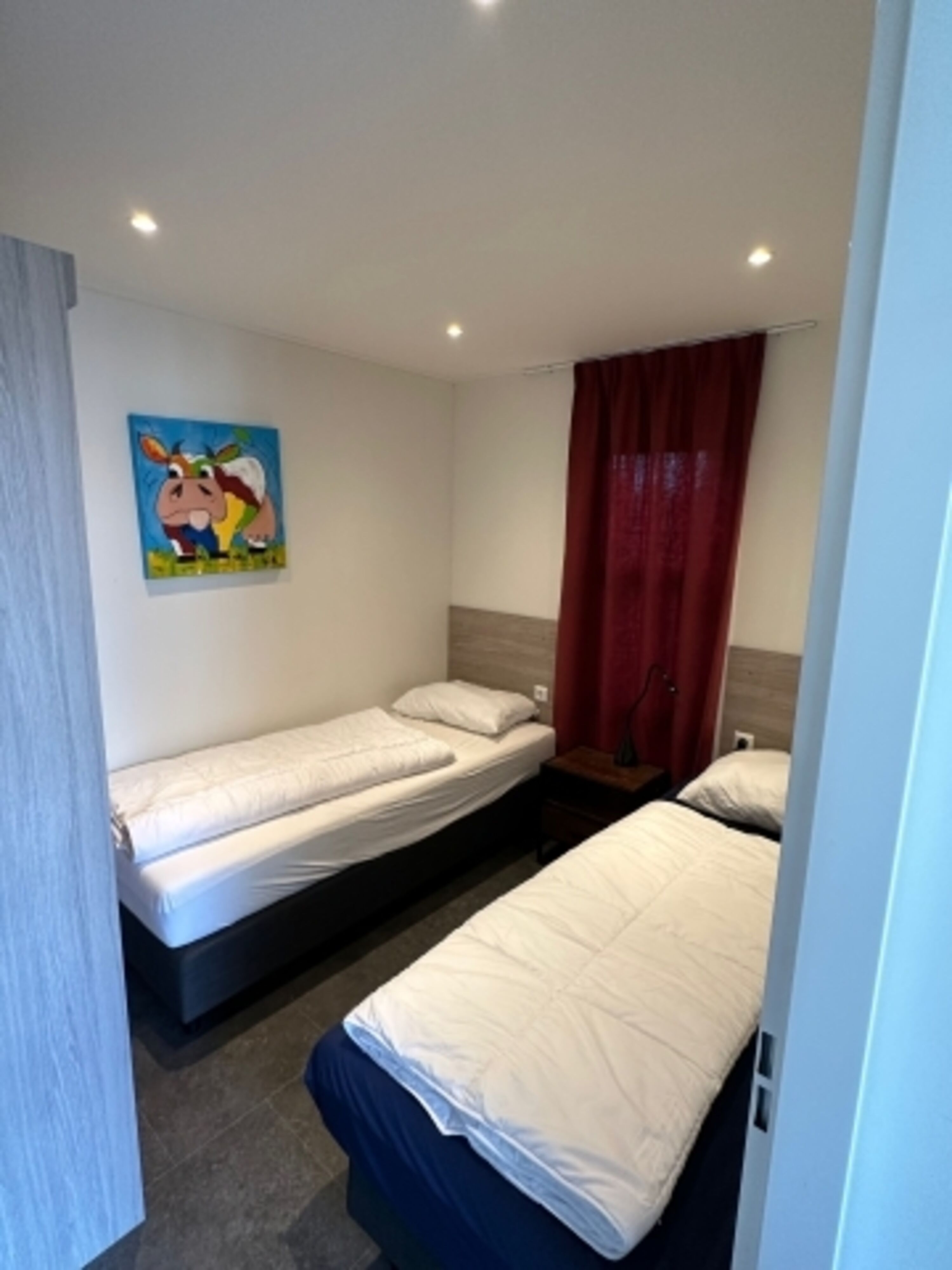 Das zweite Schlafzimmer verfügt über 2 Einzelbetten