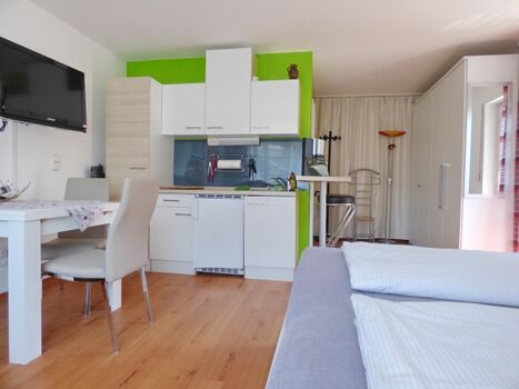 Blick zum Kleiderschrank