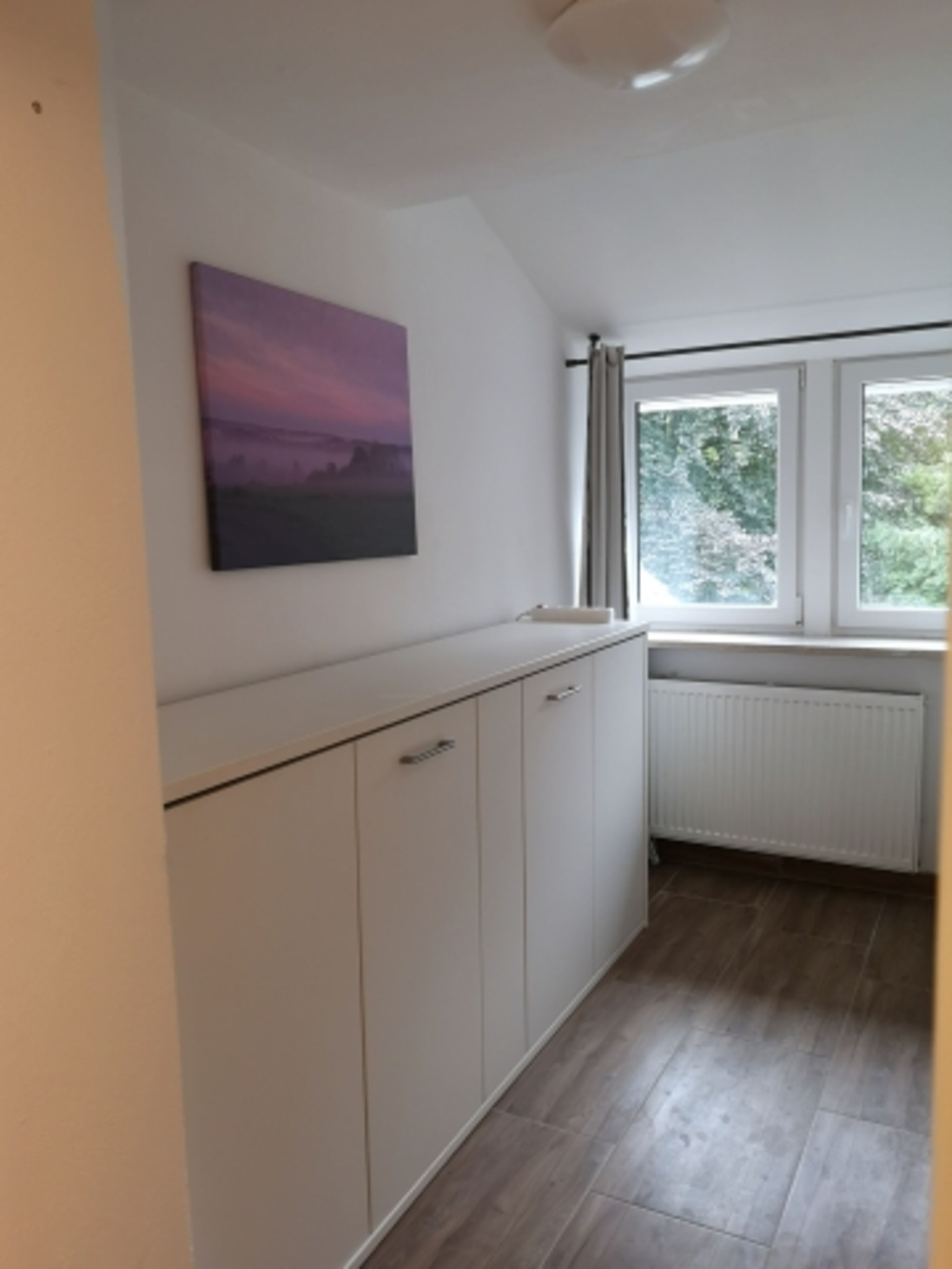 Kleines Zimmer mit Schrankbett