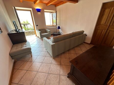 Wohnzimmer mit Schlafsofa