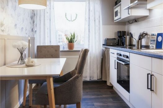 Küche mit Sitzgelegenheiten