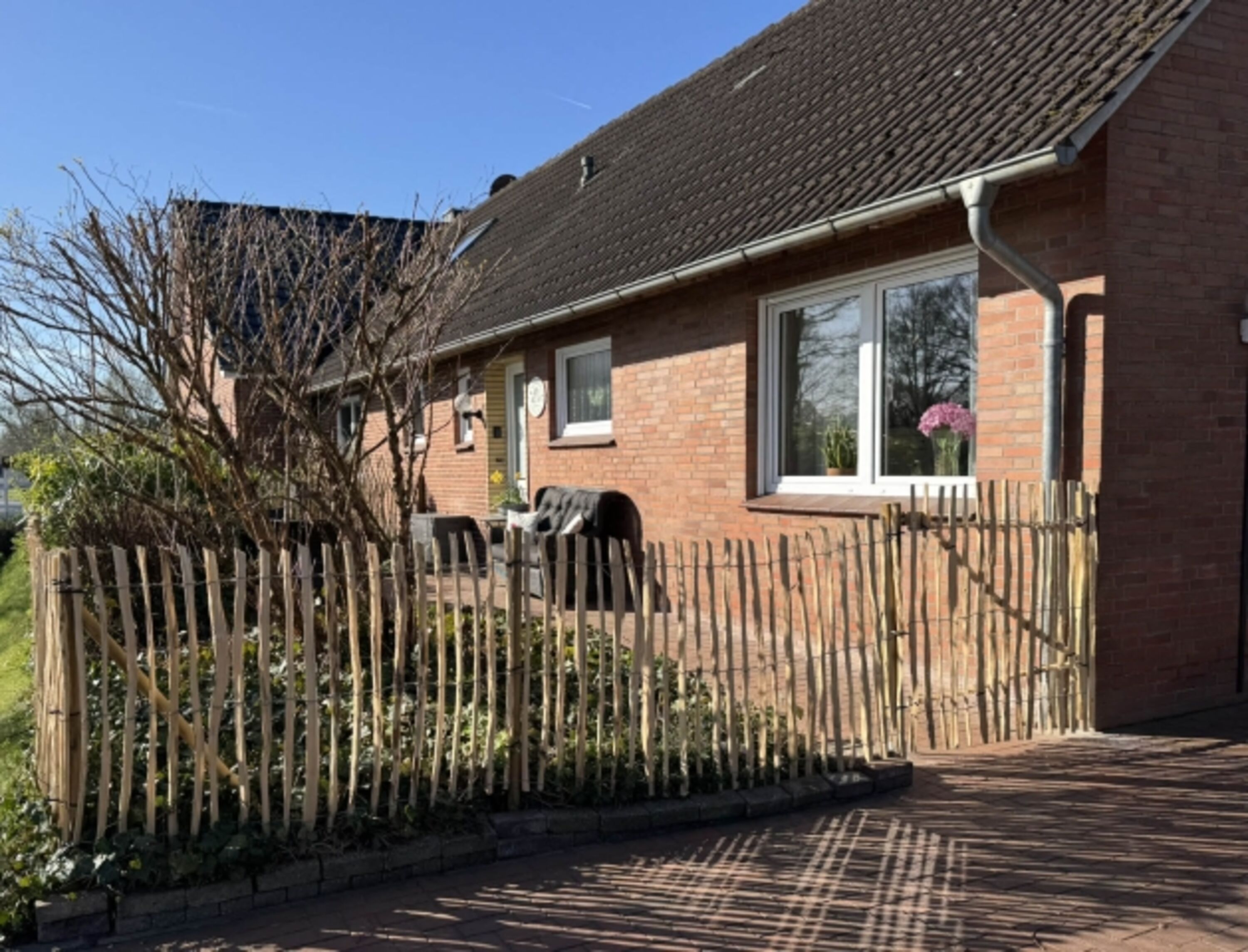 Sonnenterrasse mit Zaun