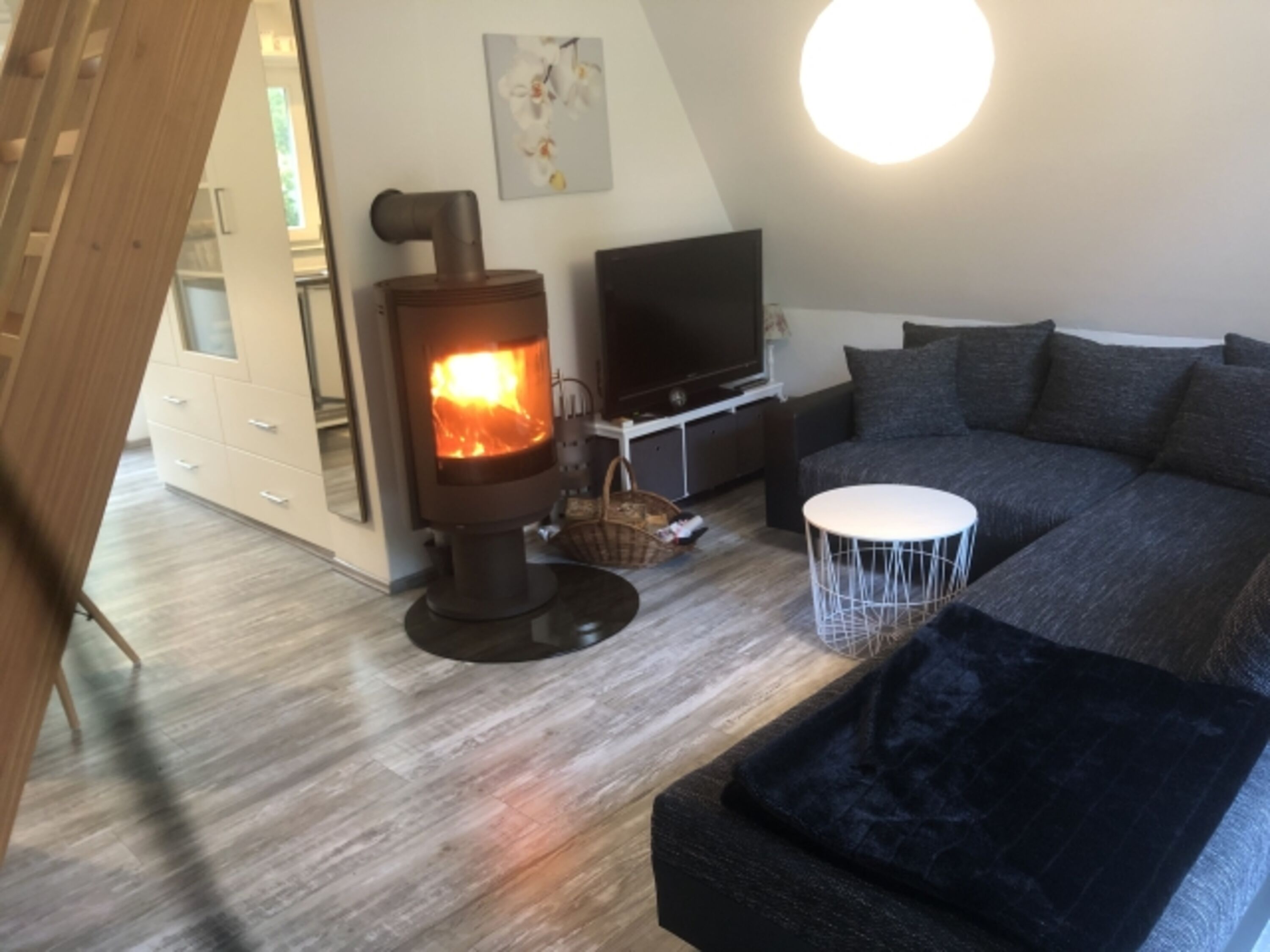 Wohnzimmer mit Kamin 