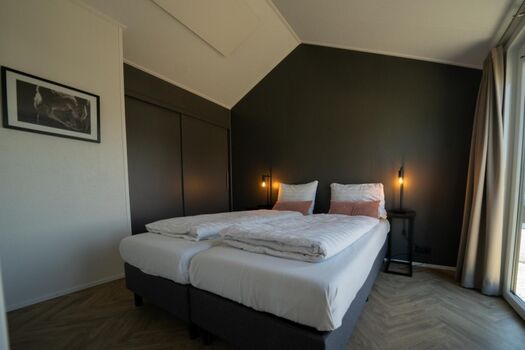 zwei Schlafzimmer mit insgesamt 4 Betten