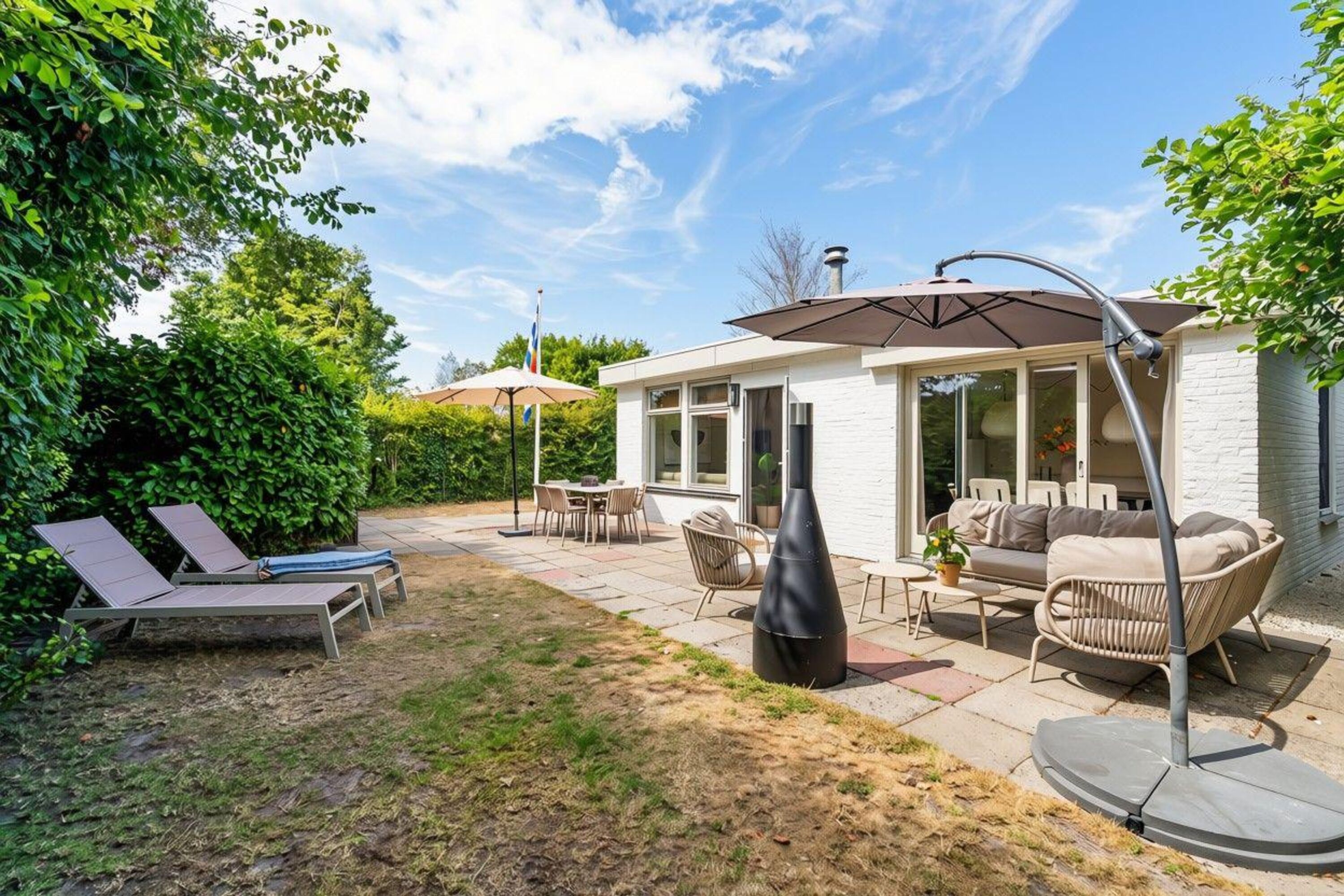 Das Ferienhaus mit eingezäuntem Garten und Terrasse