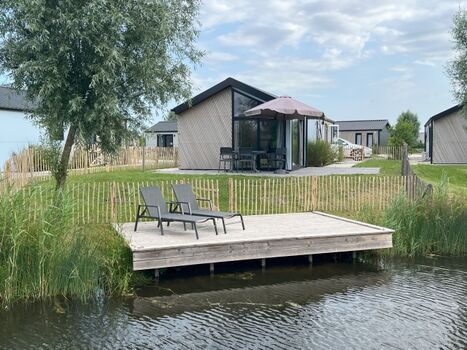 Chalet Steghouse Kampen mit Zaun und eigenem Steg