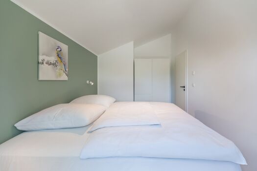 Huus Eekboom - Schlafzimmer 2 mit gemütlichem Doppelbett