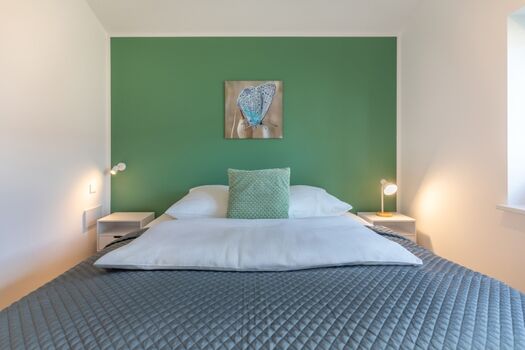 Huus Blaumees - Schlafzimmer 1 mit gemütlichem Doppelbett