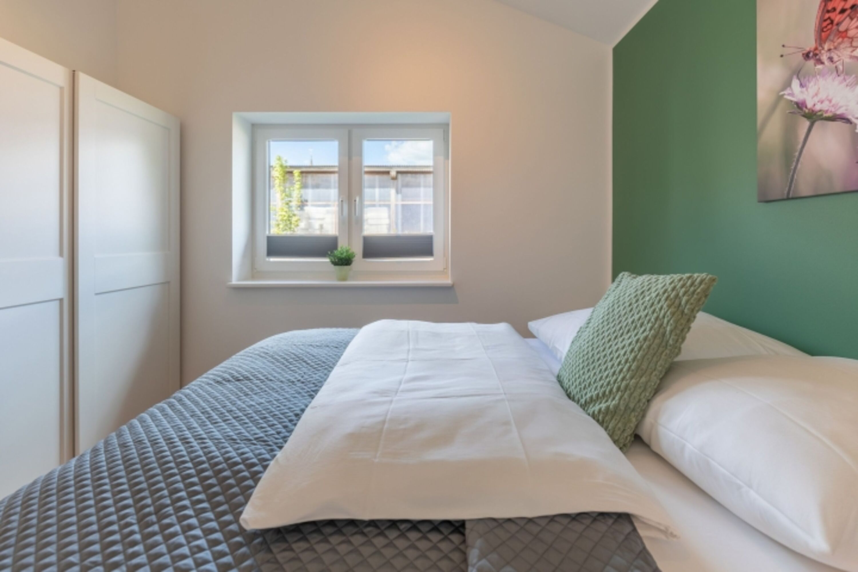 Huus Blaumees - Schlafzimmer 2 mit gemütlichem Doppelbett
