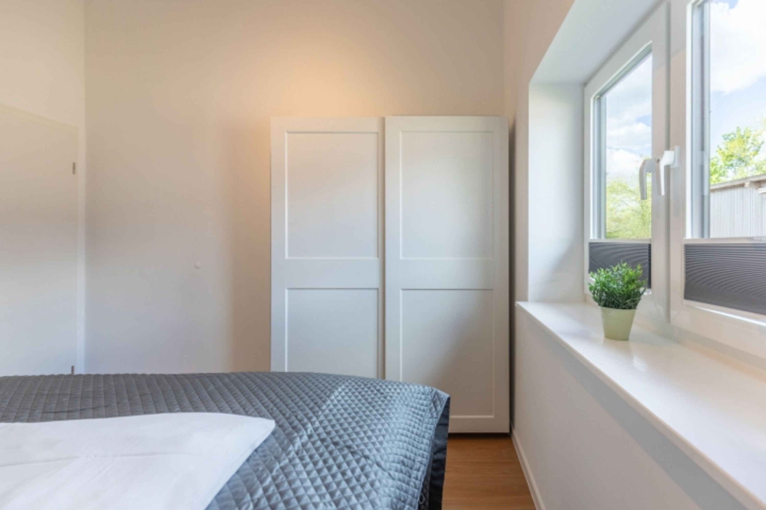 Huus Blaumees - Schlafzimmer 2 mit gemütlichem Doppelbett
