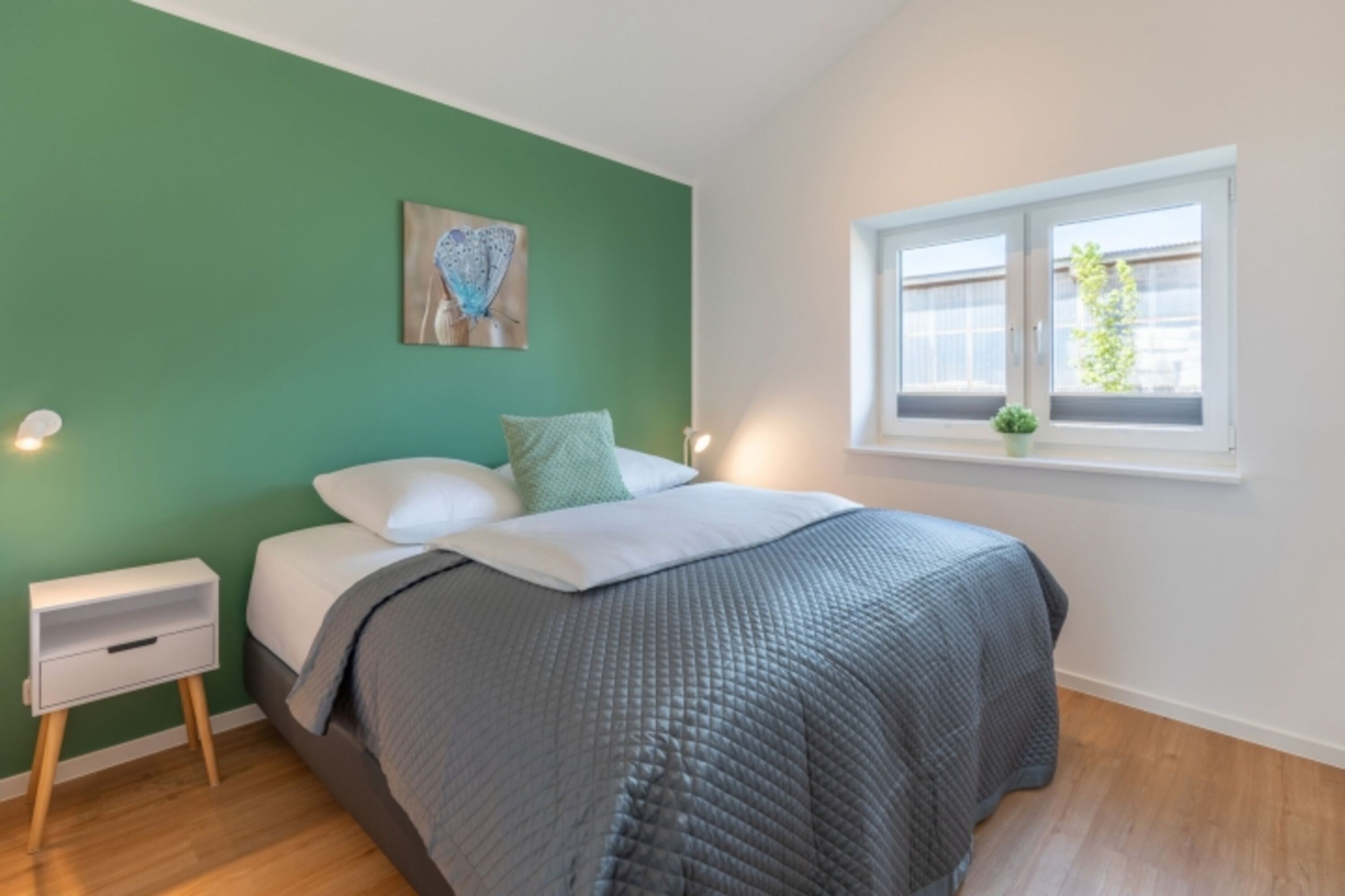 Huus Blaumees - Schlafzimmer 1 mit gemütlichem Doppelbett