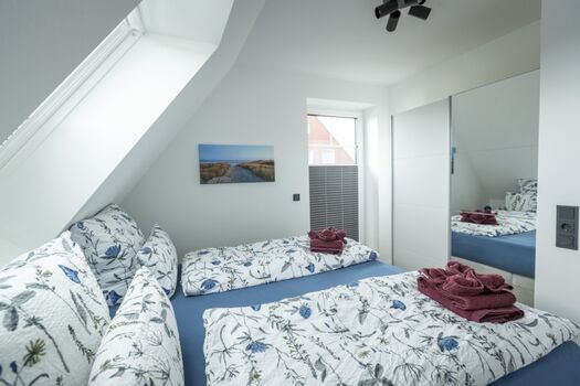 Schlafzimmer- bezogene Betten und Handtücher inklusive
