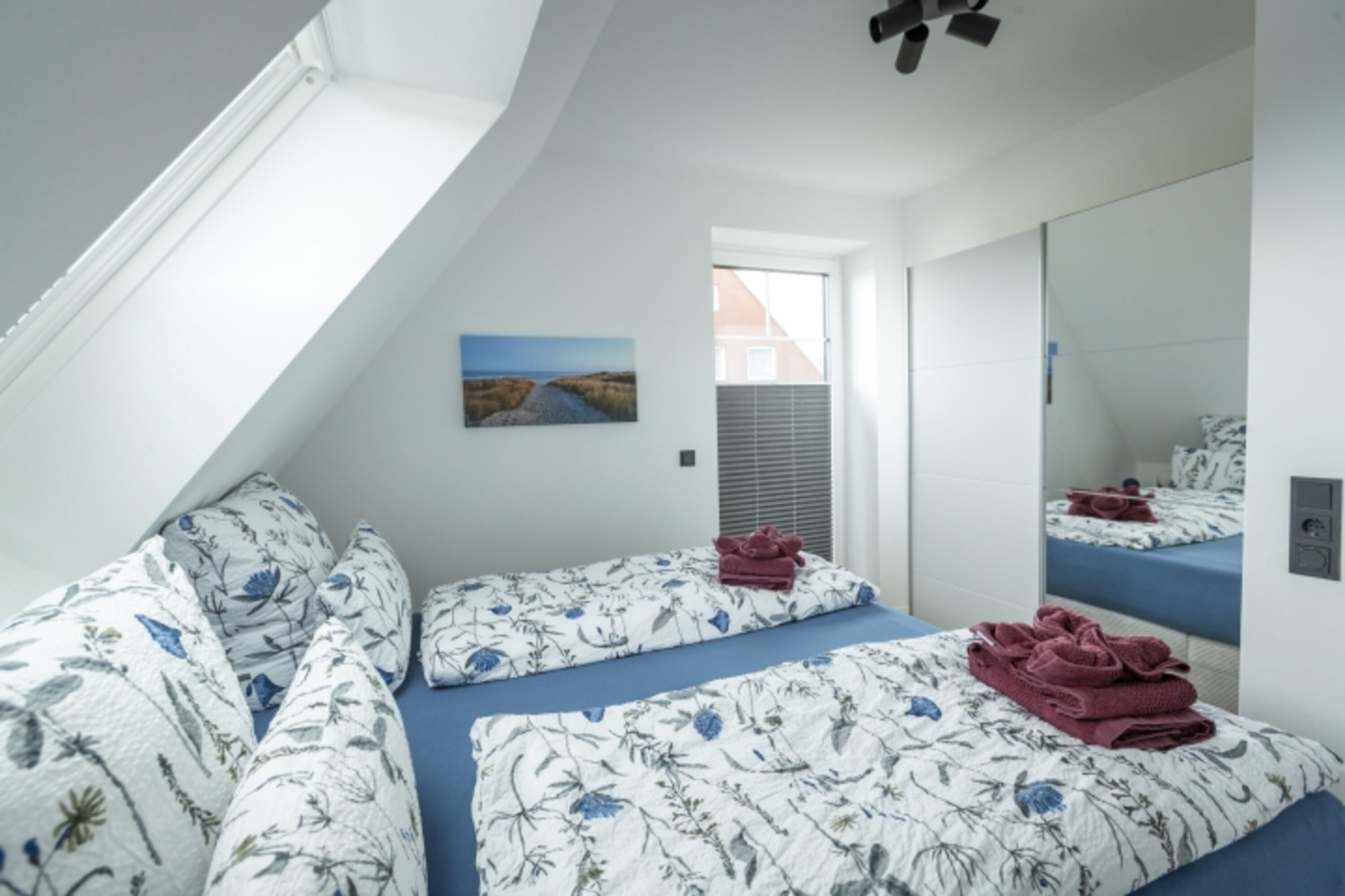 Schlafzimmer- bezogene Betten und Handtücher inklusive