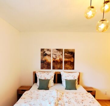 Schlafzimmer mit Boxspringbett 180x200