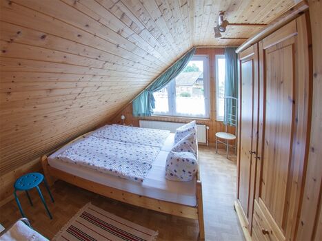 Ihr behaglicher Schlafraum mit Doppelbett