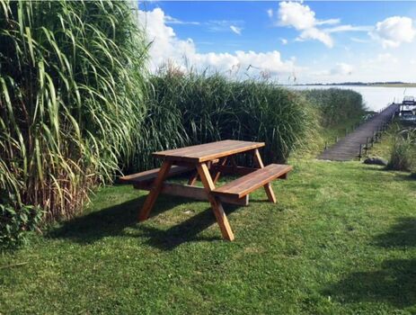 Ferienhaus Rügenbrise Seeblick auf Rügen mit eigenem Steg