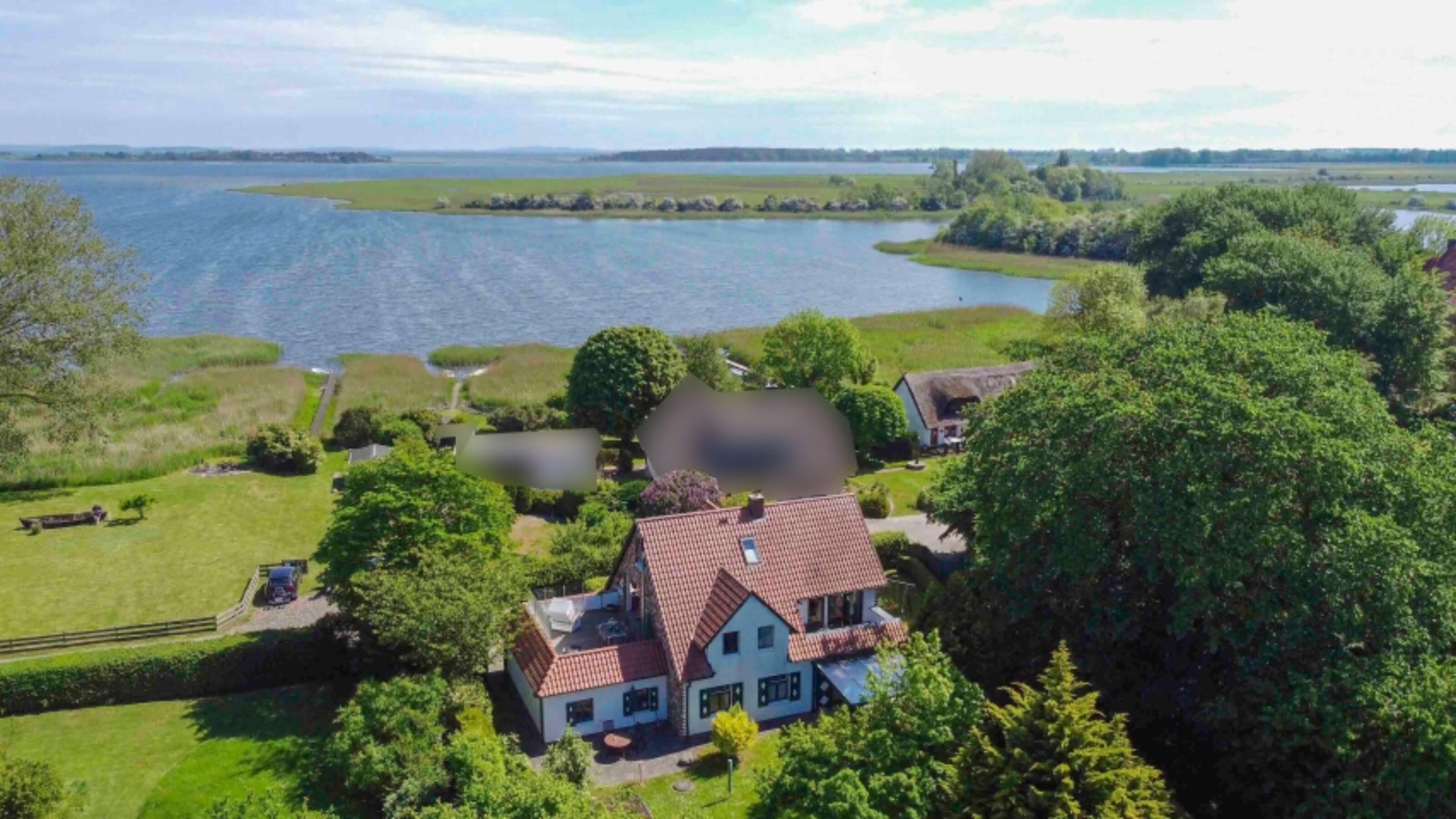 Ferienhaus Rügenbrise Seeblick direkt am Wasser