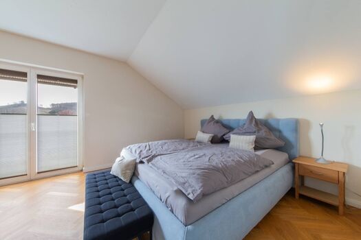 Schlafzimmer 1 mit Kingsize-Doppelbett