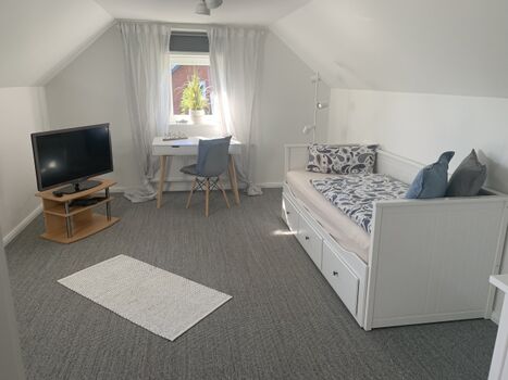 Das 3. Schlafzimmer im 1 Stock mit Auszugsbett.