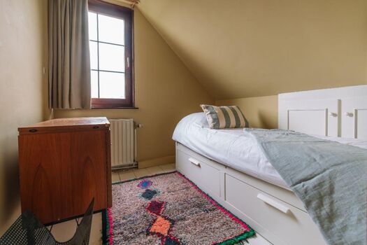 Schlafzimmer 3 mit Einzelbett und Kommode