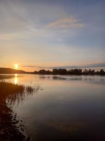 Sonnenuntergang beim Hundestrand