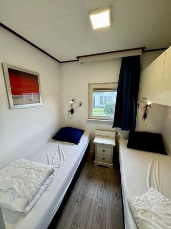 Das zweite Schlafzimmer bietet zwei gemütliche Einzelbetten