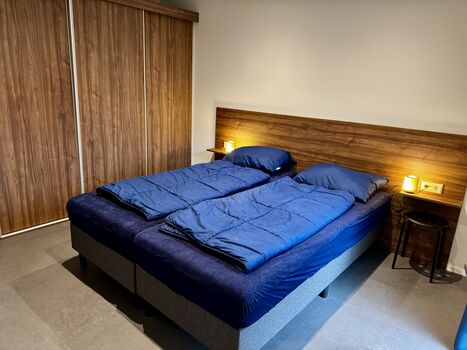 Das zweite Schlafzimmer verfügt über ein Doppelbett, welches auseinander gestellt werden kann