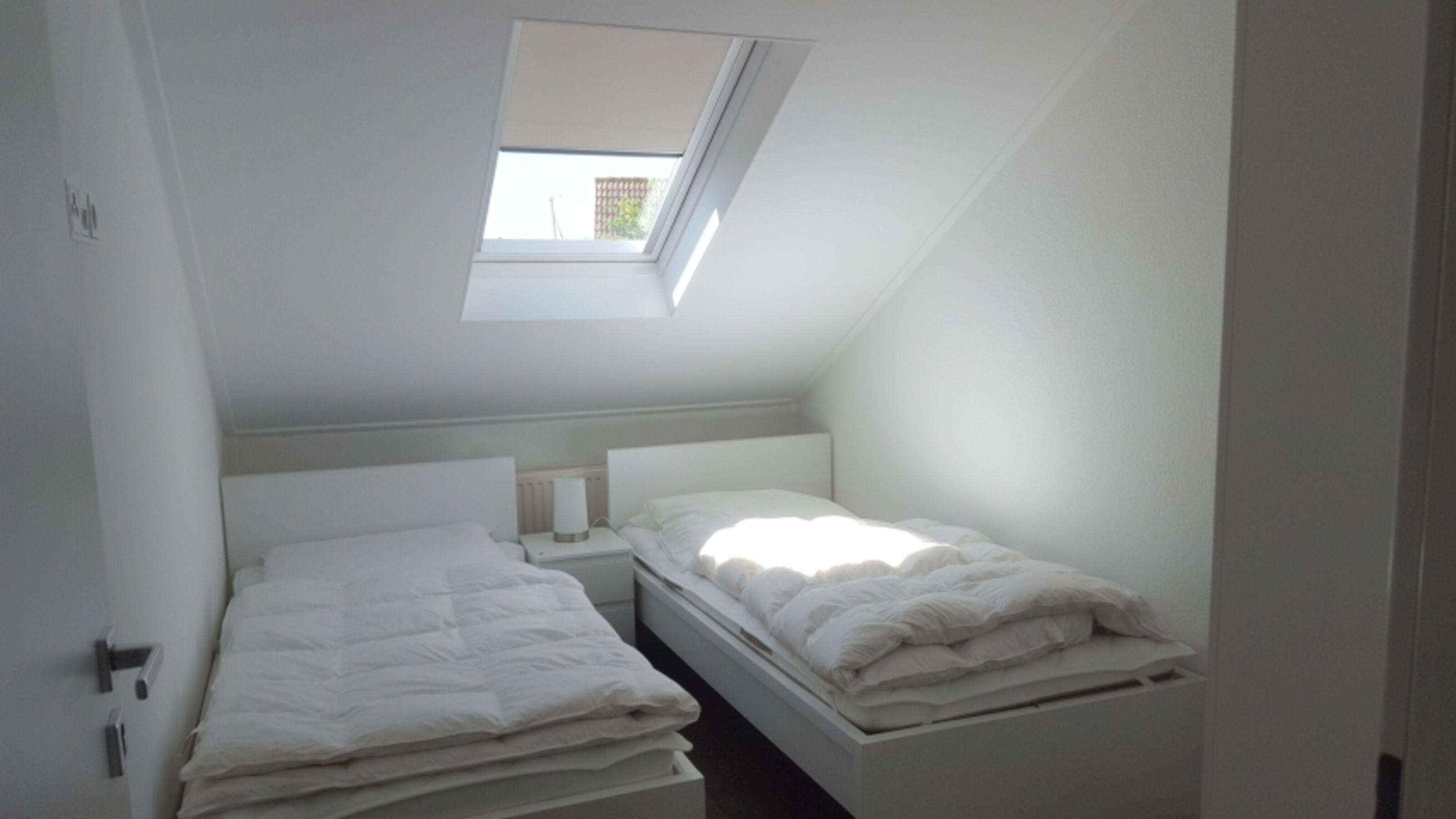 Schlafzimmer mit 2 Doppelbetten