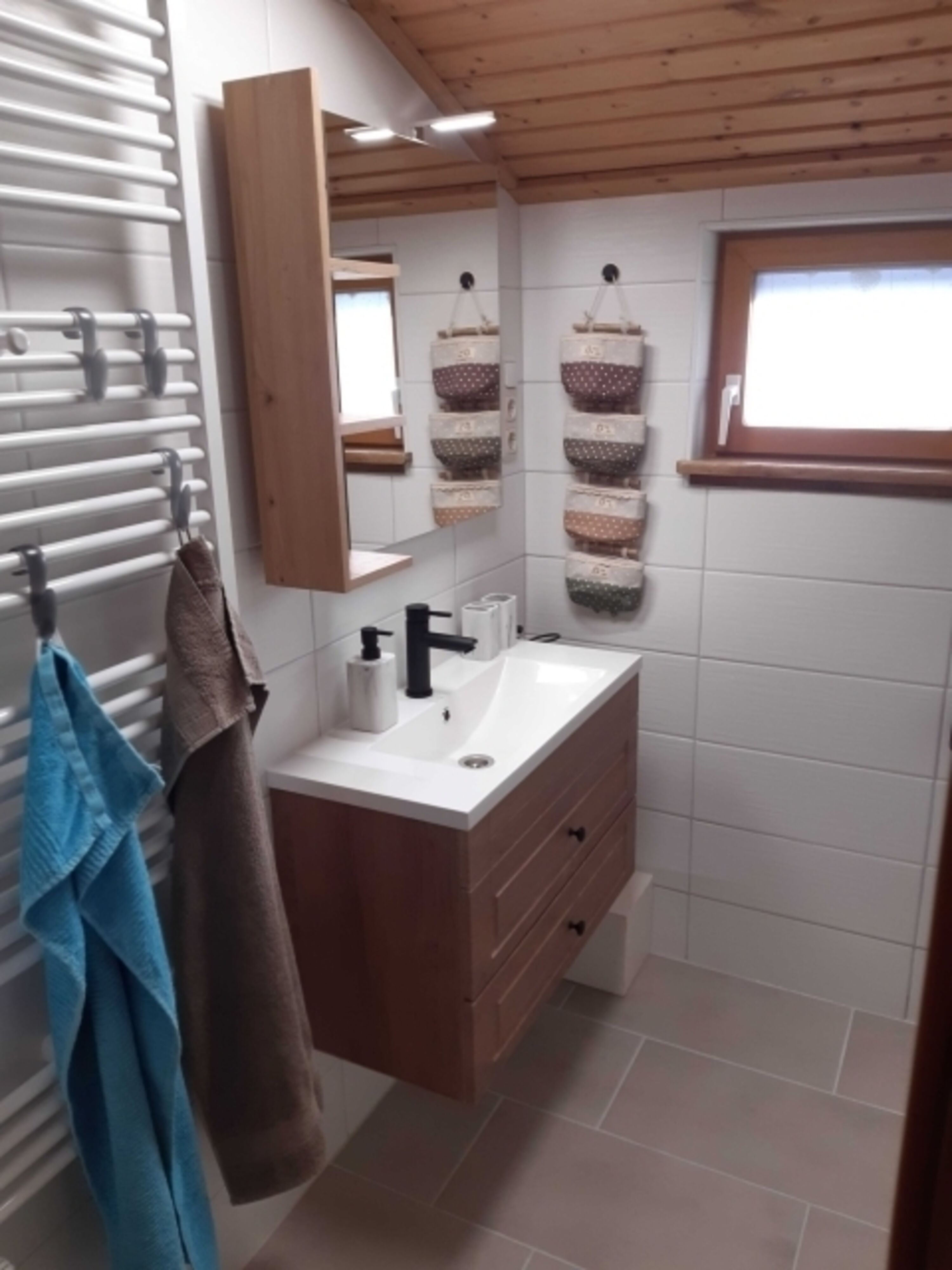 Bad mit Bodenebender Dusche