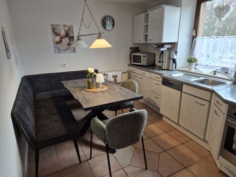 Küche mit gemütlicher Sitzecke