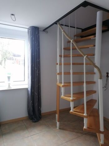 Wendeltreppe zu den Schlafmöglichkeiten