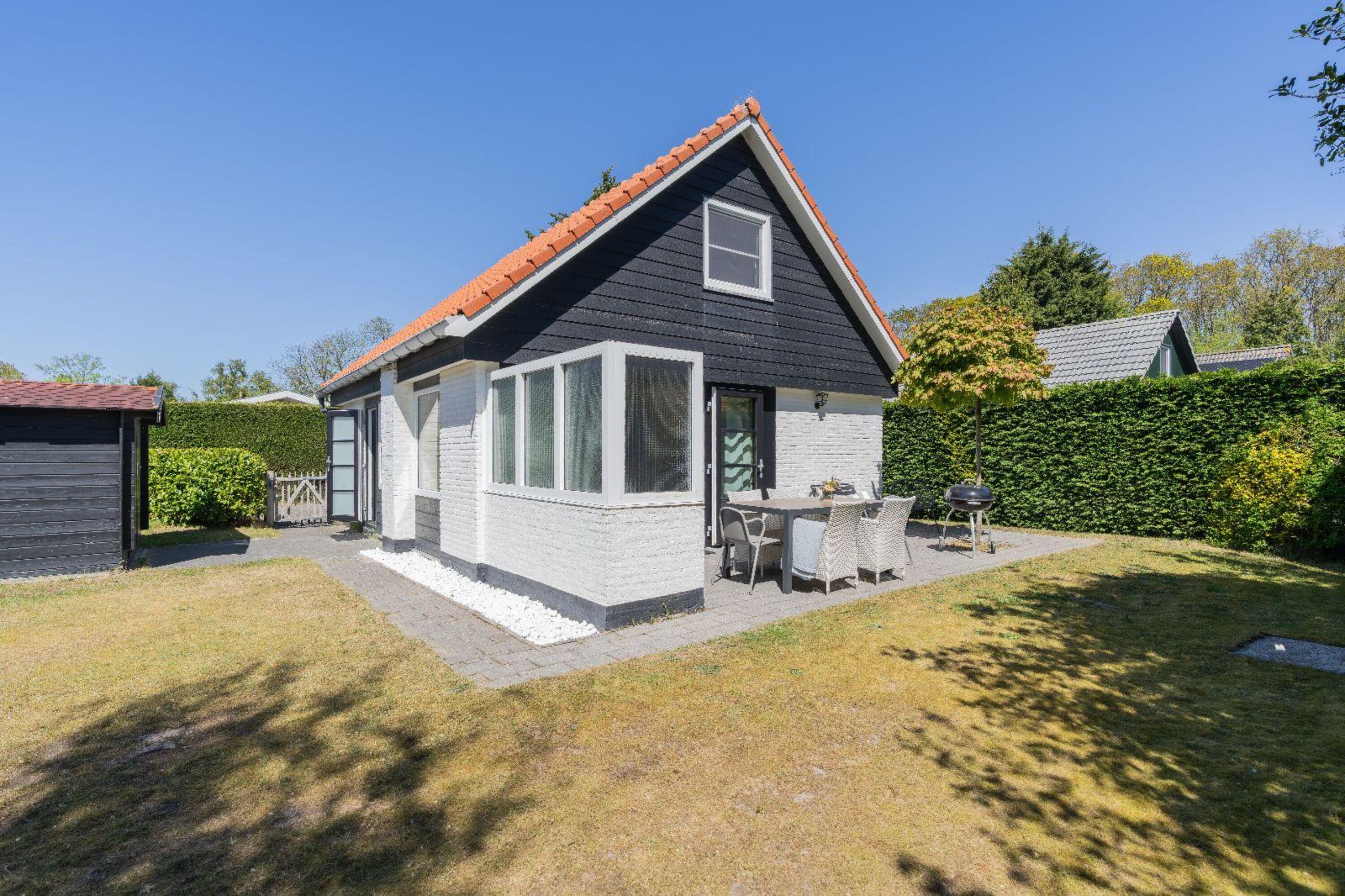 Das Ferienhaus mit eingezäuntem Garten