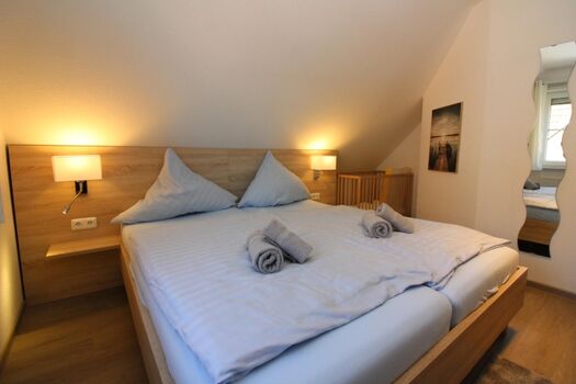 Ferienhaus BUH 83 Schlafzimmer 1 OG