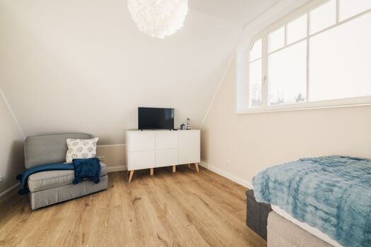 Schlafzimmer mit Schlafsessel