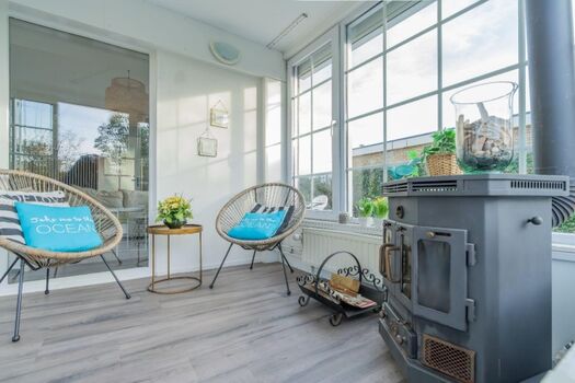 Der Wintergarten mit Kamin