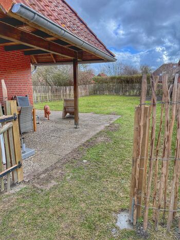 Tor zum eingezäunten Garten