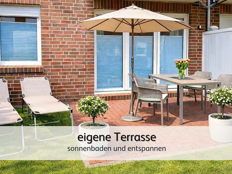 genießt den Sonnenuntergang auf der Terrasse