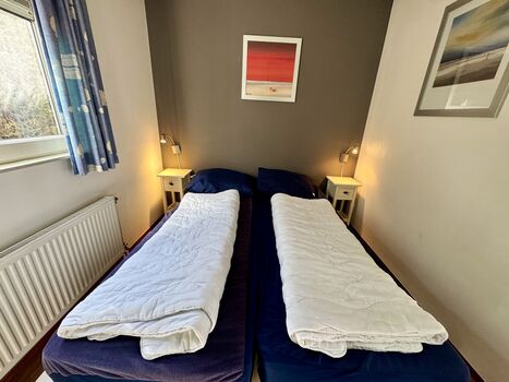 Das Hauptschlafzimmer verfügt über ein bequemes Doppelbett