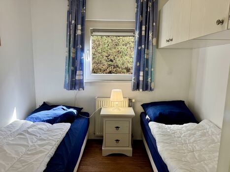 Das zweite Schlafzimmer eignet sich hervorragend für Kinder