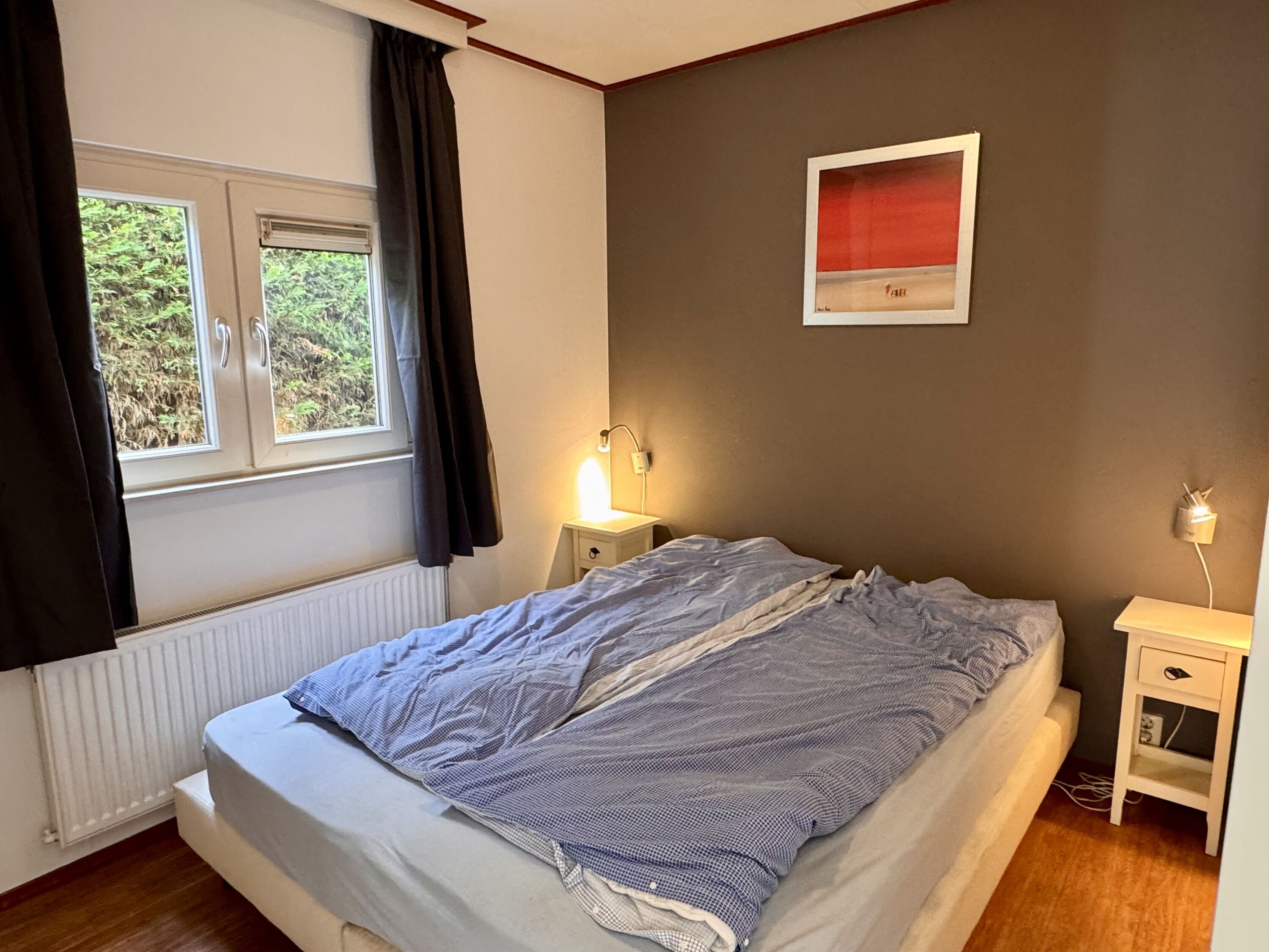 Hauptschlafzimmer mit Verdunklungsvorhängen