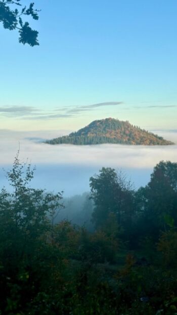 Wolken über unseren Ferienhäusern aber den Spitzberg sieht man