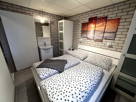 Schlafen 1 im Erdgeschoss mit Waschgelegenheit